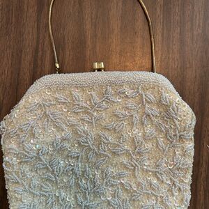 Genuine vintage 1960s beaded white clutch with silk interior